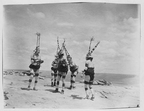 picture shows five koshare clowns performing at the Hopi-Tewa village of Hano, ca. 1891